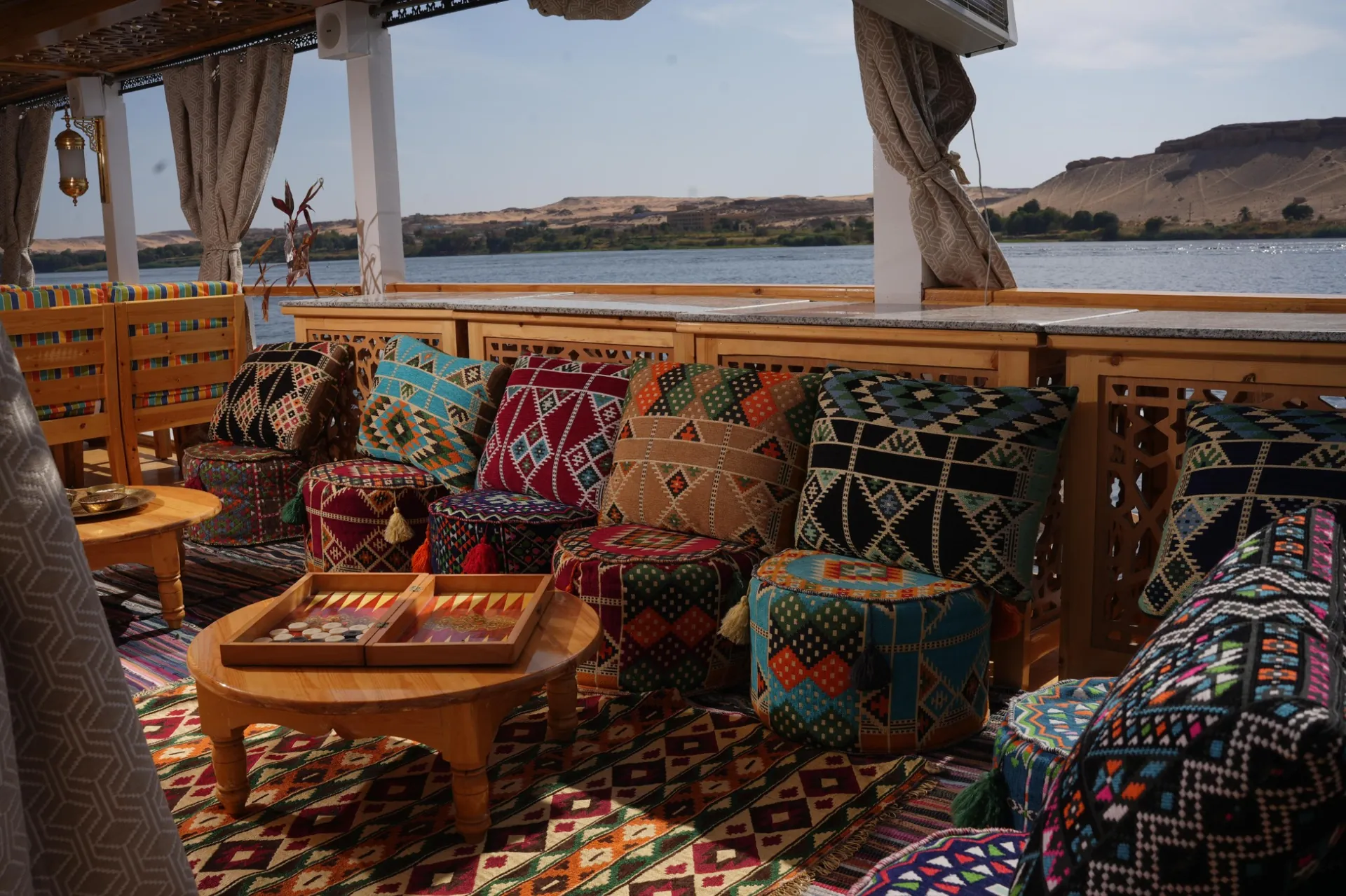 Traditional Dahabeya boat moored on the riverbank