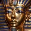 a gold and blue egyptian mask