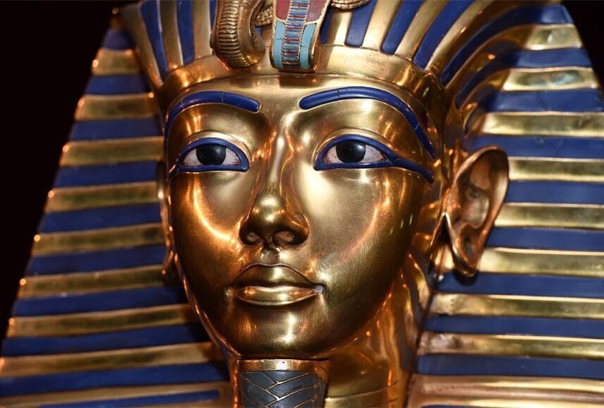 a gold and blue egyptian mask